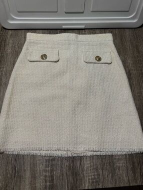 Elegant Cream Tweed Mini Skirt with Decorative Buttons